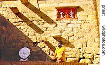 priest at a roadside sun-temple